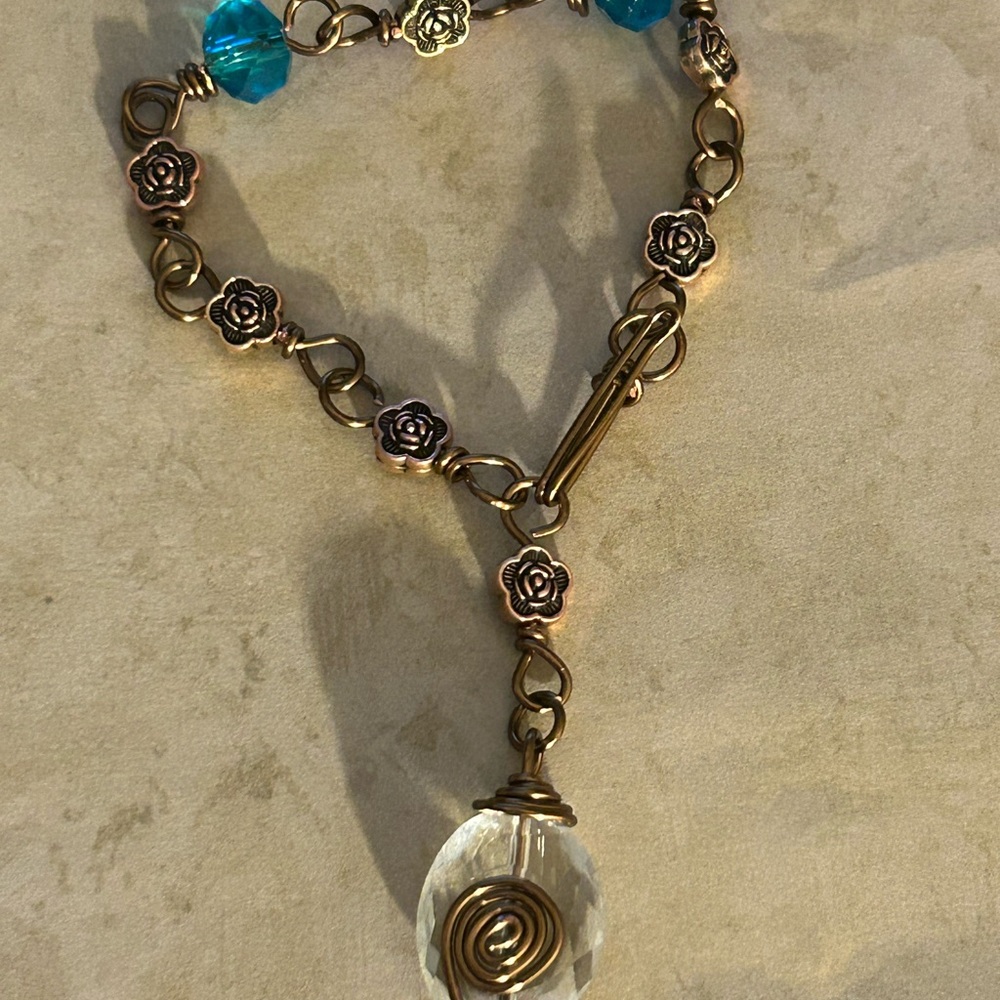 Elegant antique brass and  sky Blue Rose bracelet
